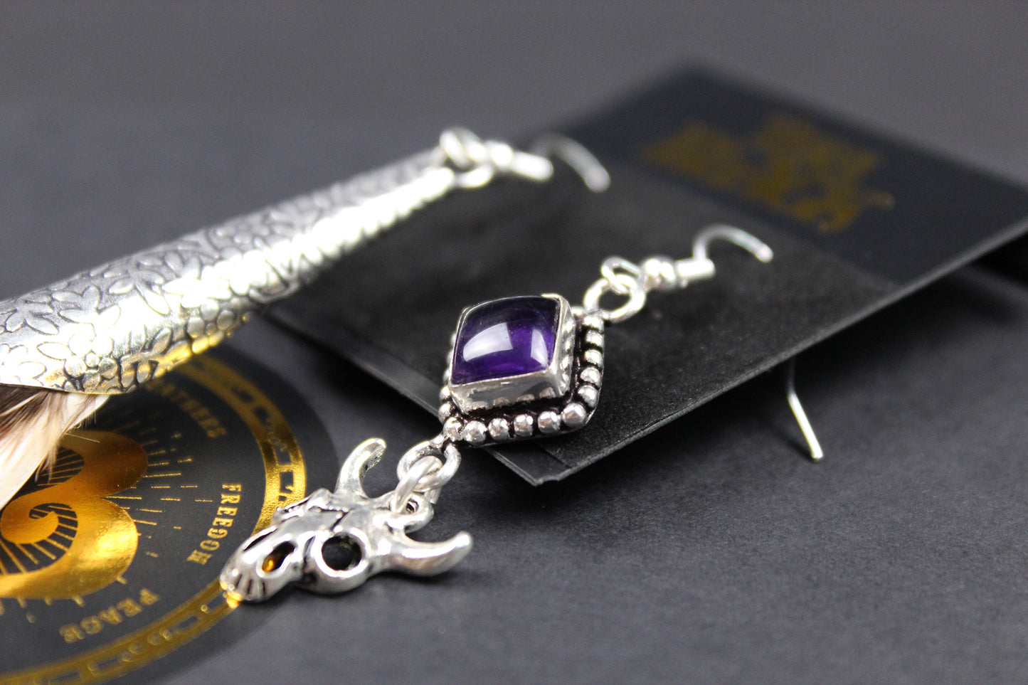 The Harlequin Earring Set - White and purple natural feather earrings with amethyst stone, asymmetrical pair of boho rock n roll earrings