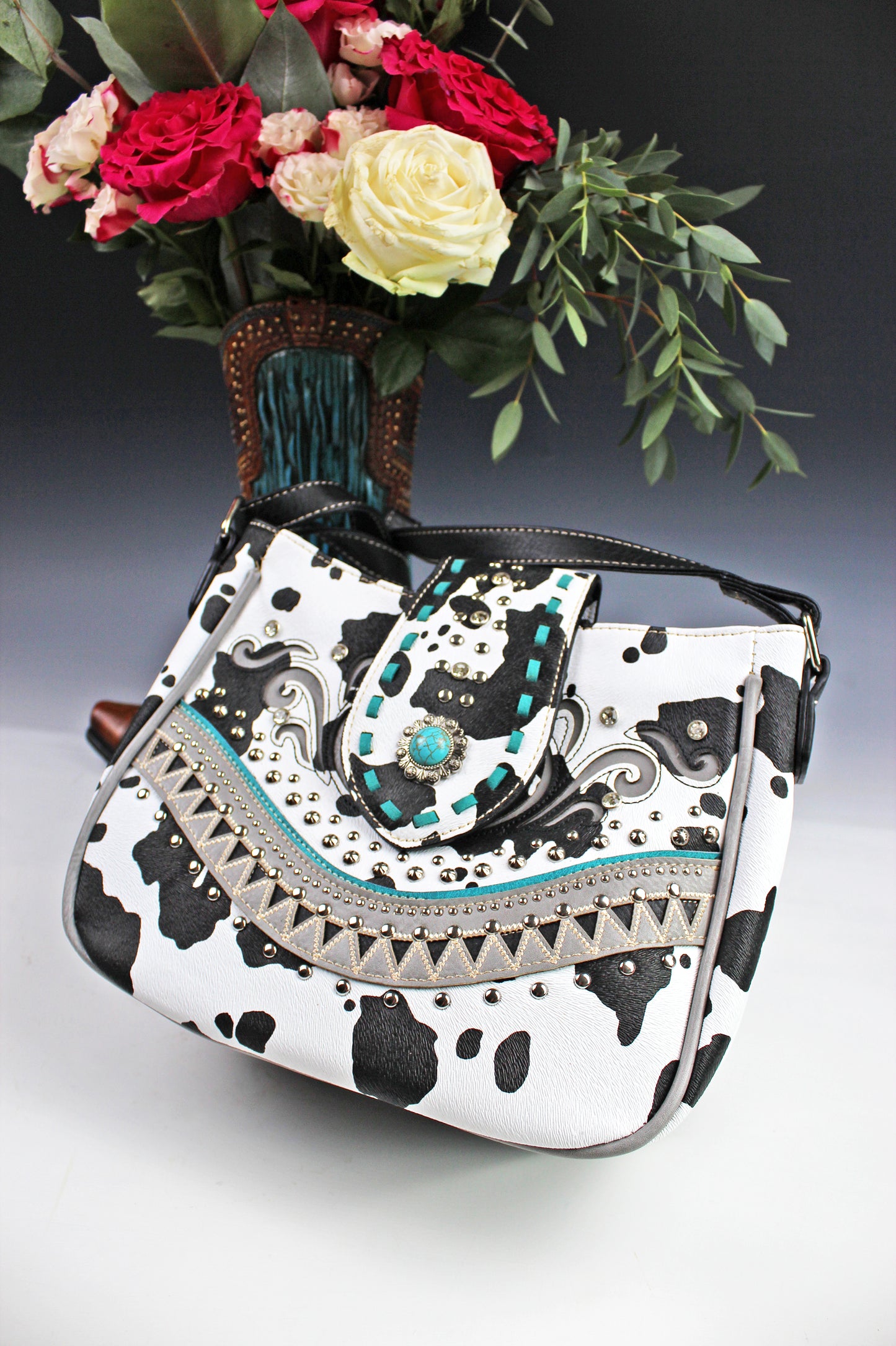 The Dallas Shoulder Bag - cowhide pattern western cowgirl style bag with intricate detailing with turquoise accents & an internal zip pocket