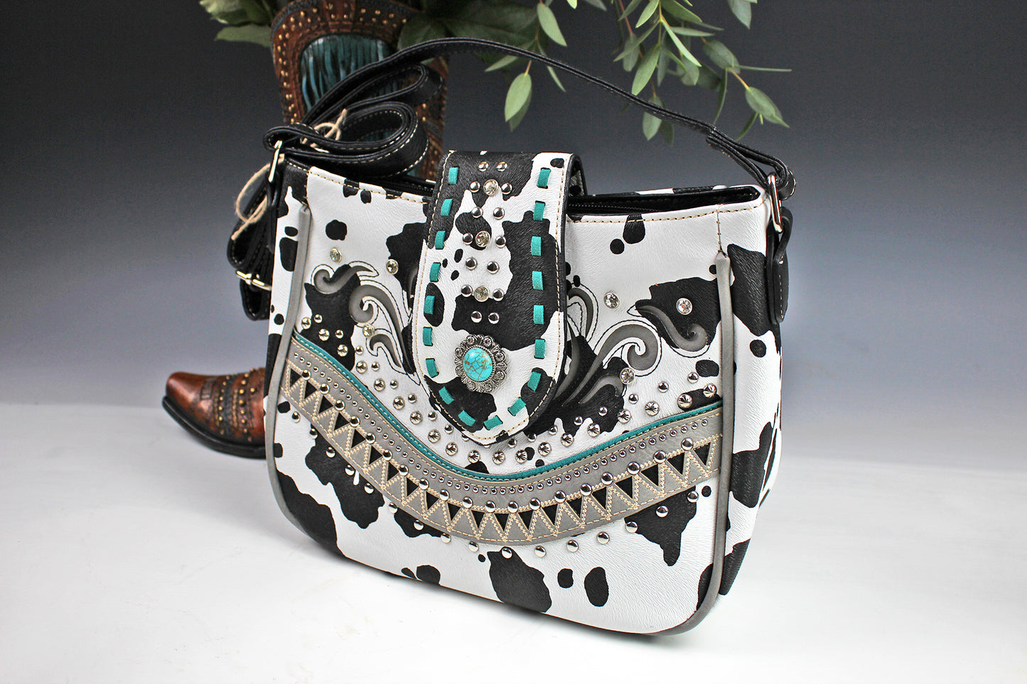 The Dallas Shoulder Bag - cowhide pattern western cowgirl style bag with intricate detailing with turquoise accents & an internal zip pocket