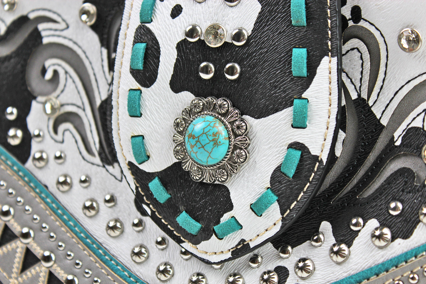 The Dallas Shoulder Bag - cowhide pattern western cowgirl style bag with intricate detailing with turquoise accents & an internal zip pocket
