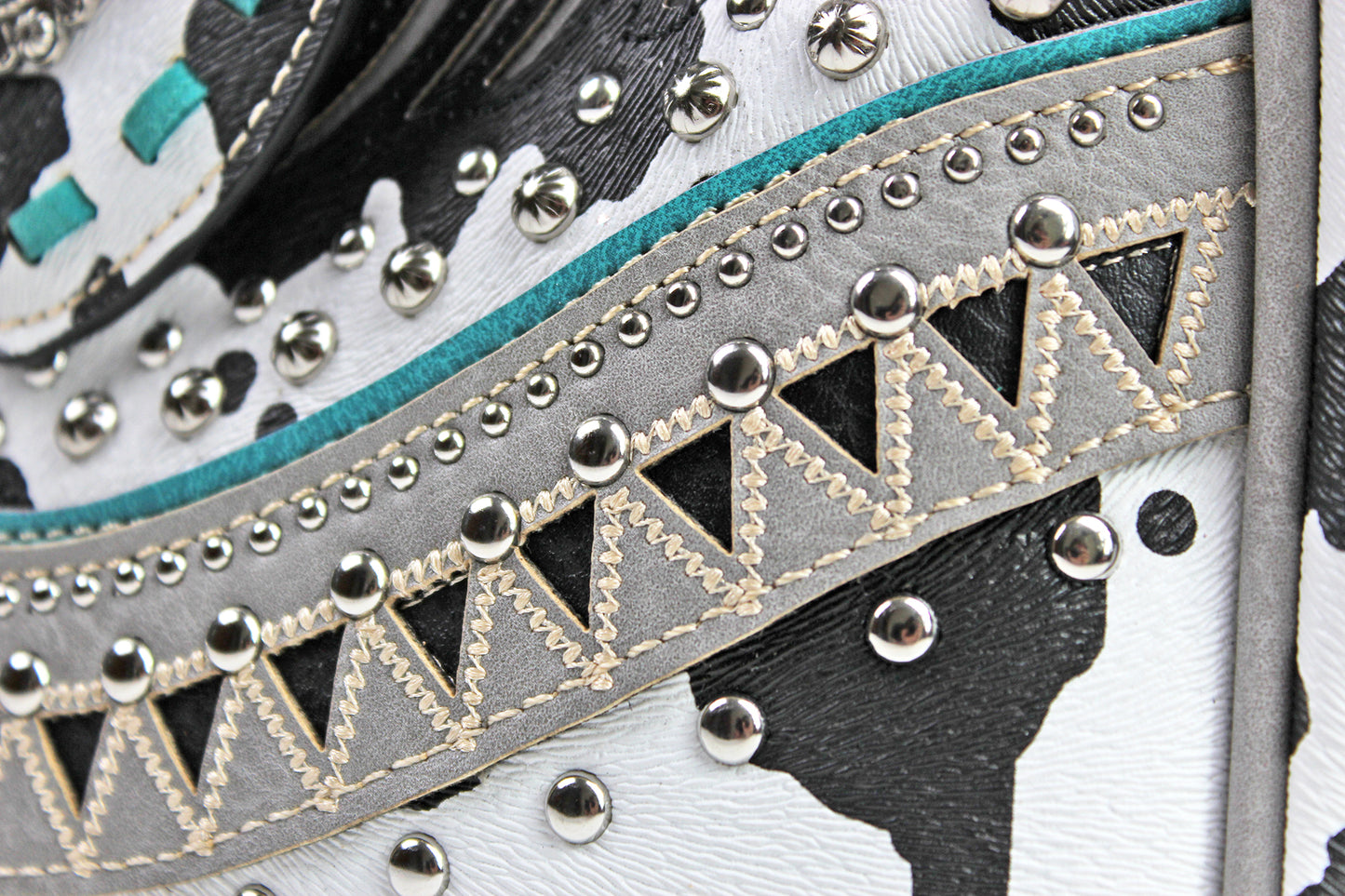 The Dallas Shoulder Bag - cowhide pattern western cowgirl style bag with intricate detailing with turquoise accents & an internal zip pocket