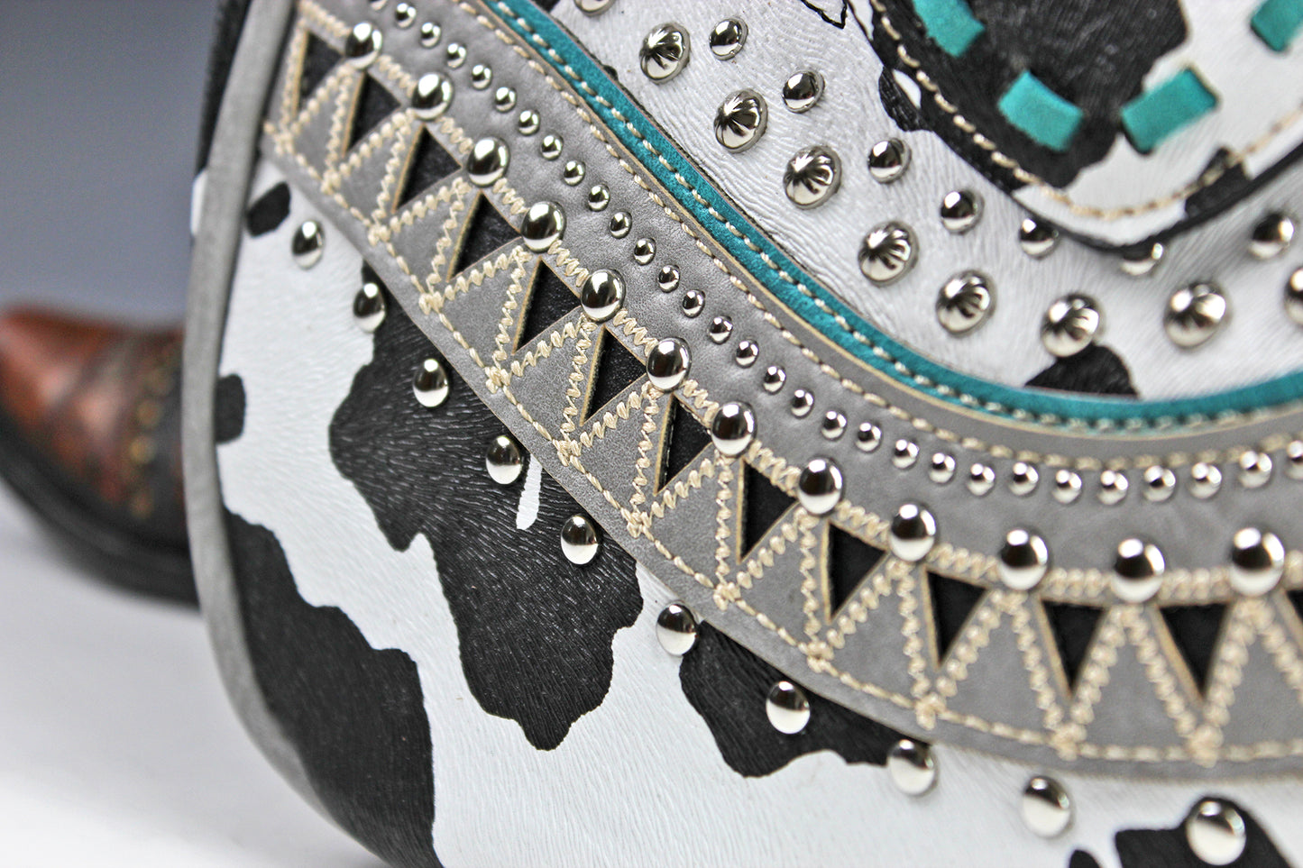 The Dallas Shoulder Bag - cowhide pattern western cowgirl style bag with intricate detailing with turquoise accents & an internal zip pocket