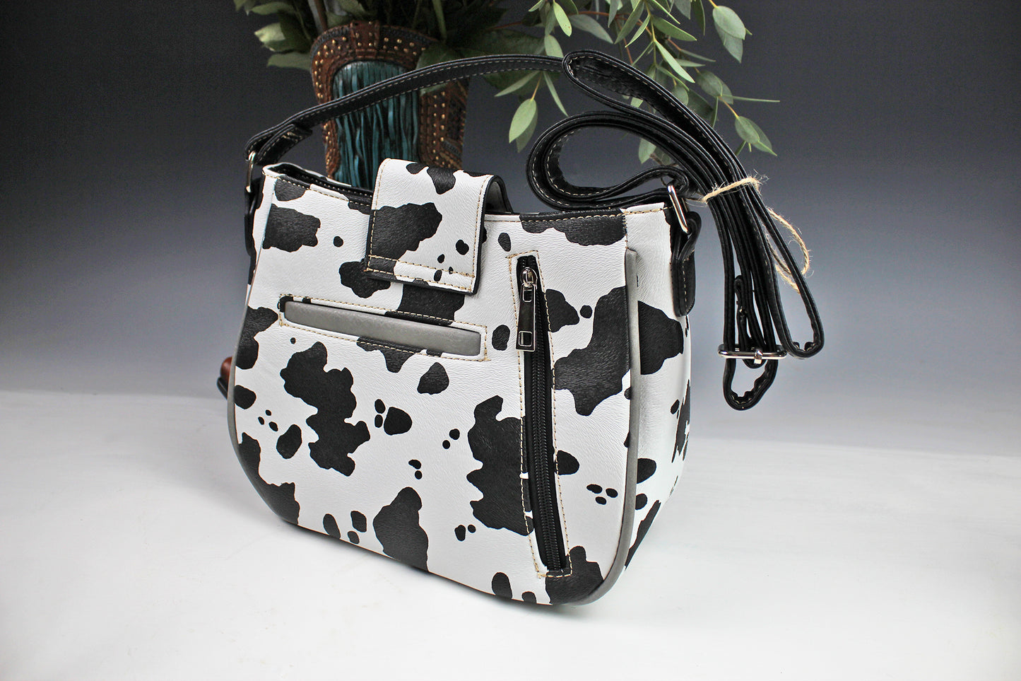 The Dallas Shoulder Bag - cowhide pattern western cowgirl style bag with intricate detailing with turquoise accents & an internal zip pocket