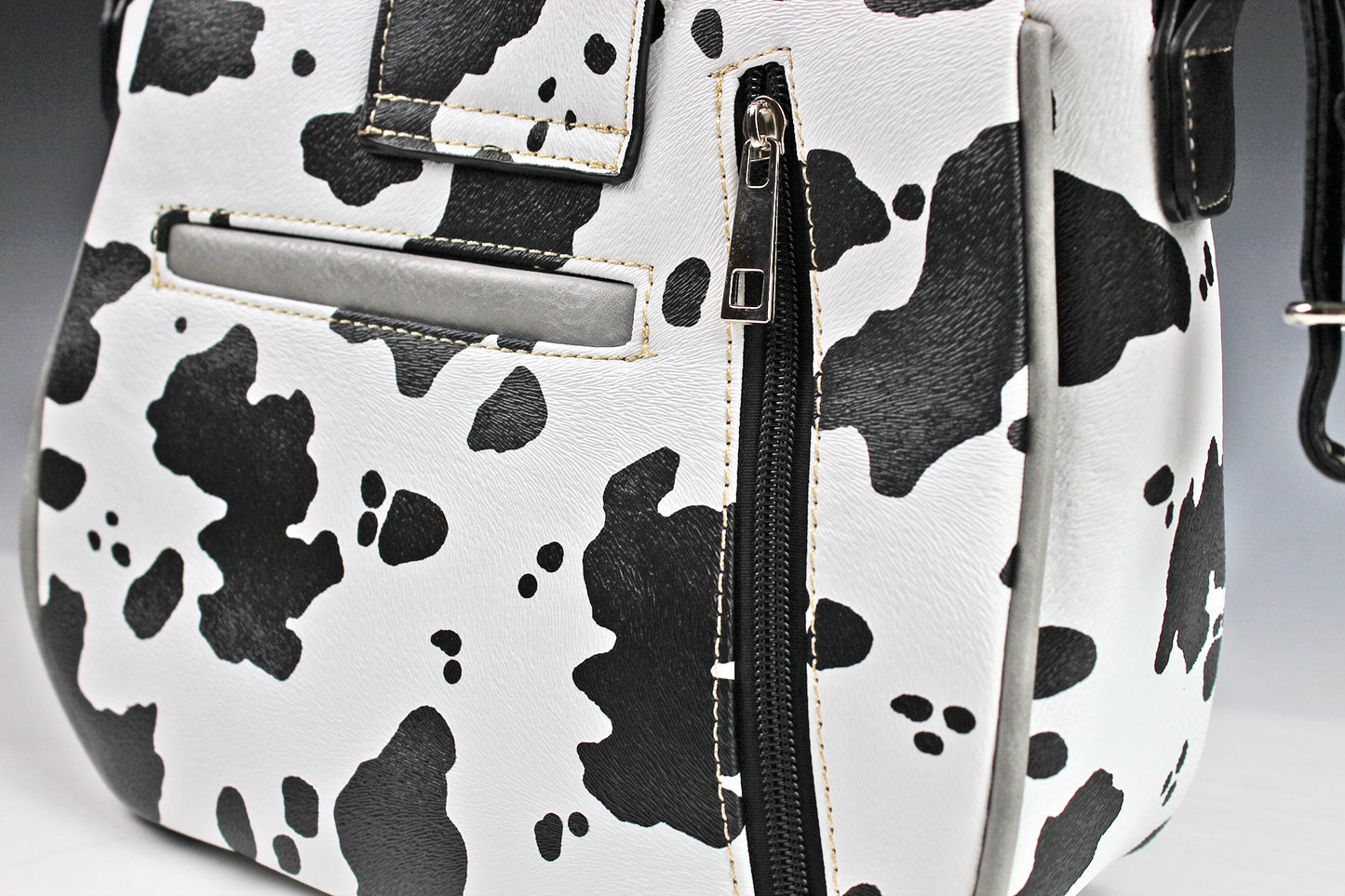 The Dallas Shoulder Bag - cowhide pattern western cowgirl style bag with intricate detailing with turquoise accents & an internal zip pocket