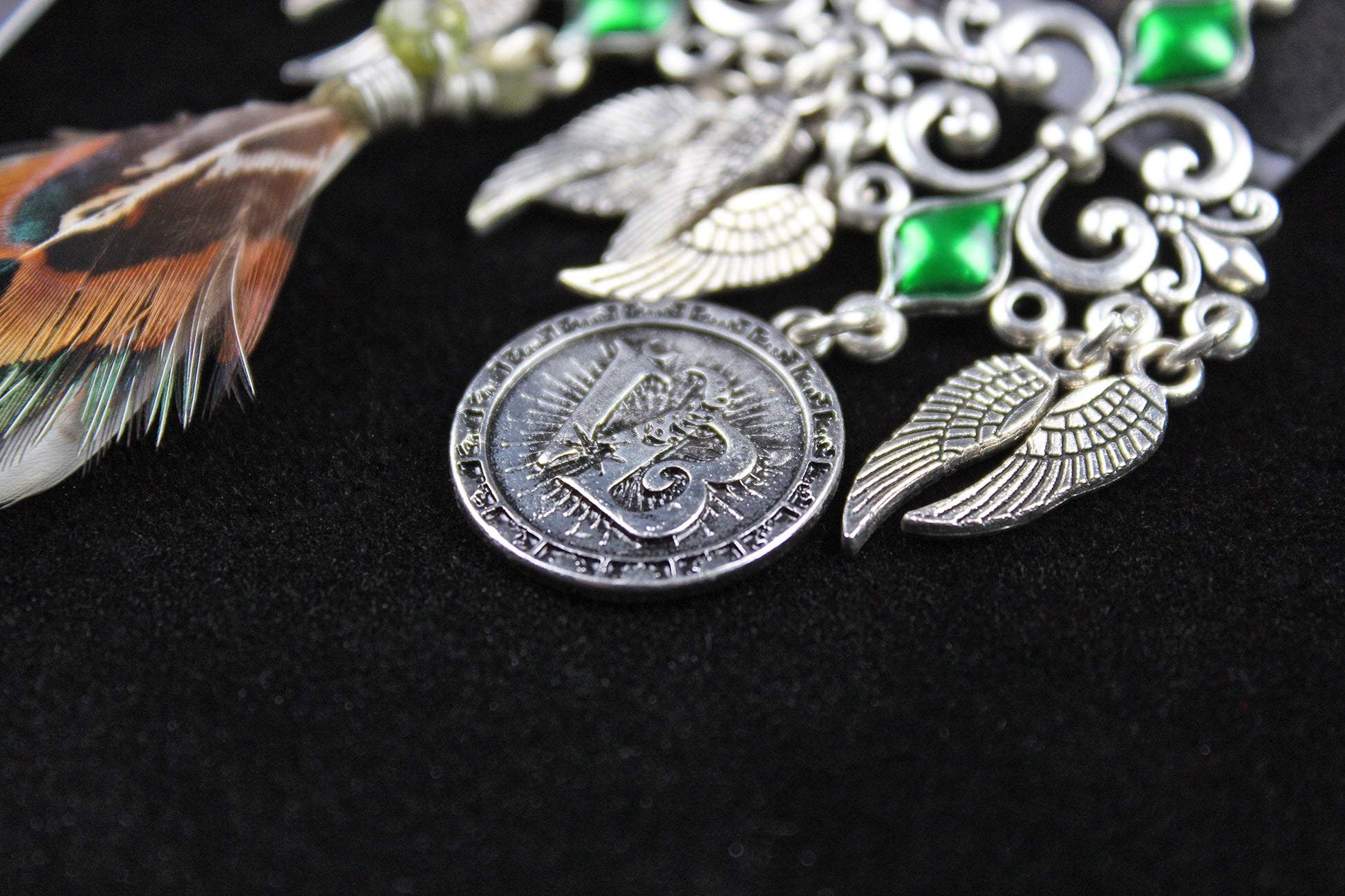 Emerald Forest Feather Earrings : Bohemian Style Feather Earrings With A Filigree Design