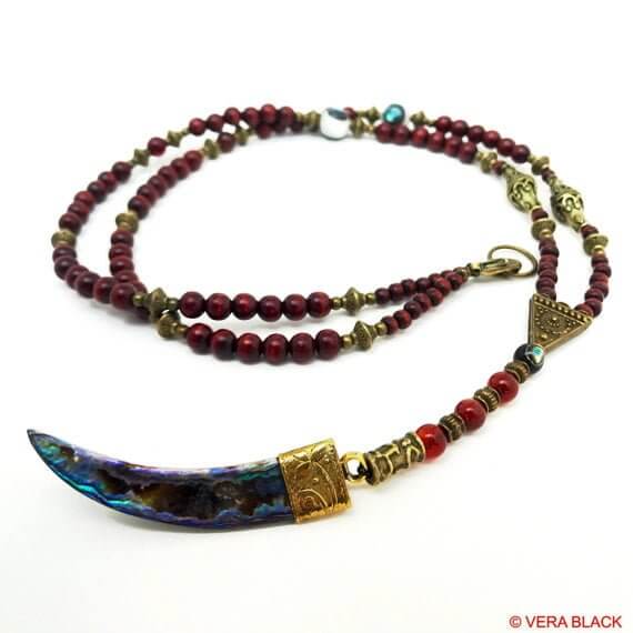 long beaded necklace with antique bronze detailing and wood beading