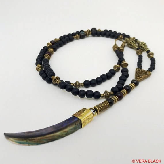 long beaded necklace with antique bronze detailing and wood beading