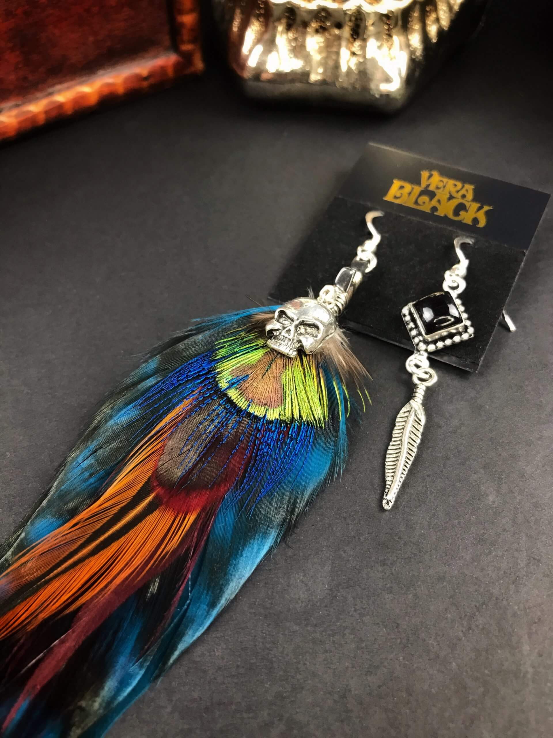 Teal Feather Silver Skull Earrings - rock n roll silver skull feather earrings with black onyx stone