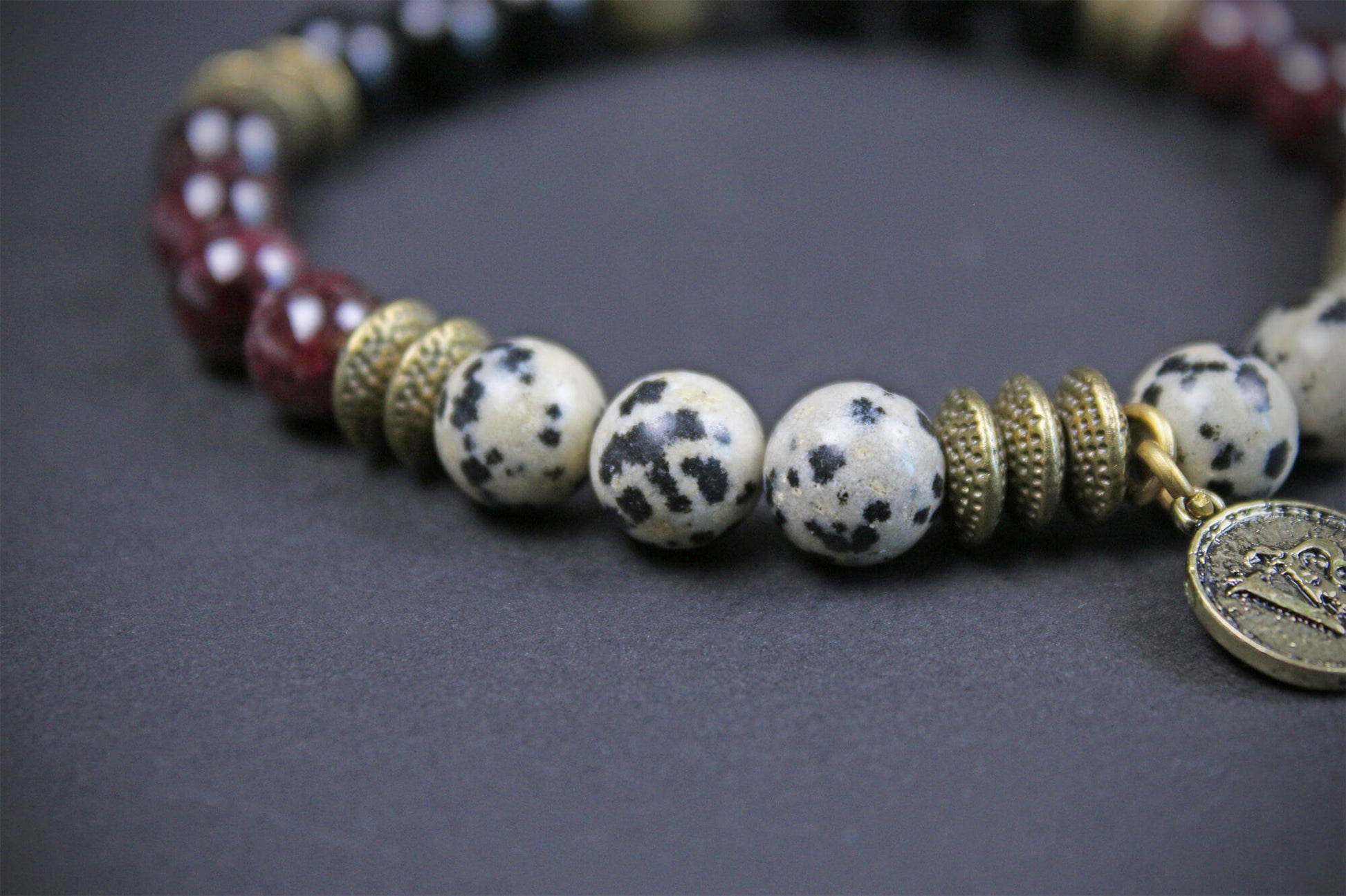 The Snake Eyes Bracelet - Black Onyx Red Garnet Dalmation Jasper Bronze Detailing Rock n Roll Pirate Style Unisex For Men And Women