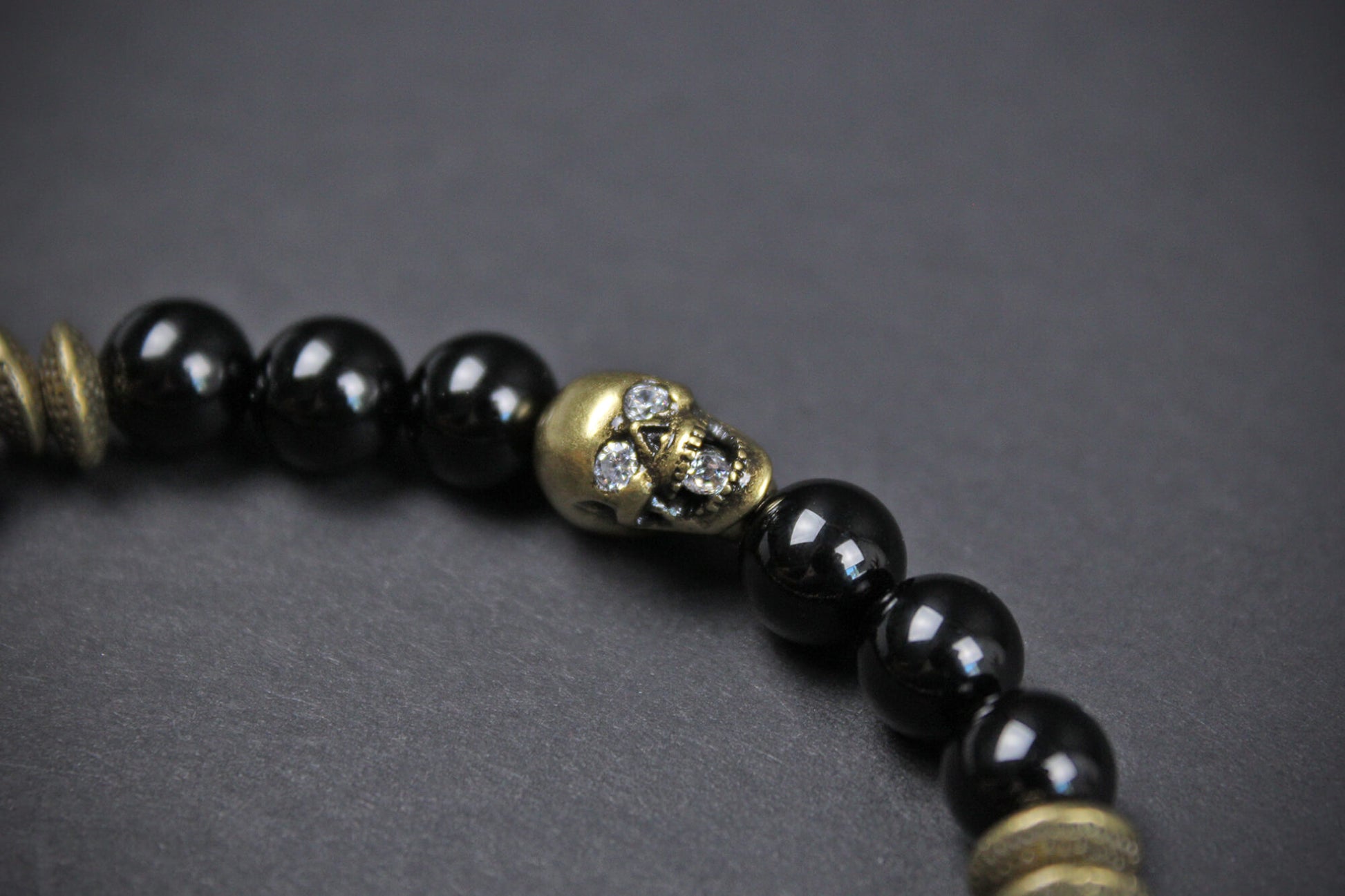 The Snake Eyes Bracelet - Black Onyx Red Garnet Dalmation Jasper Bronze Detailing Rock n Roll Pirate Style Unisex For Men And Women