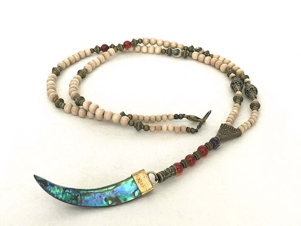 long beaded necklace with antique bronze detailing and wood beading