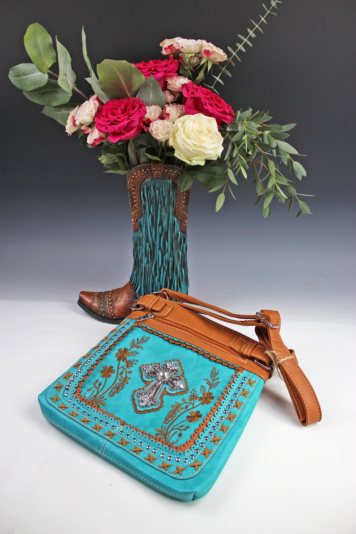 The Montana Shoulder Bag - turquoise & brown western cowgirl style bag with intricate detailing and cross motif with an internal zip pocket