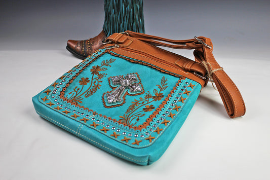 The Montana Shoulder Bag - turquoise & brown western cowgirl style bag with intricate detailing and cross motif with an internal zip pocket