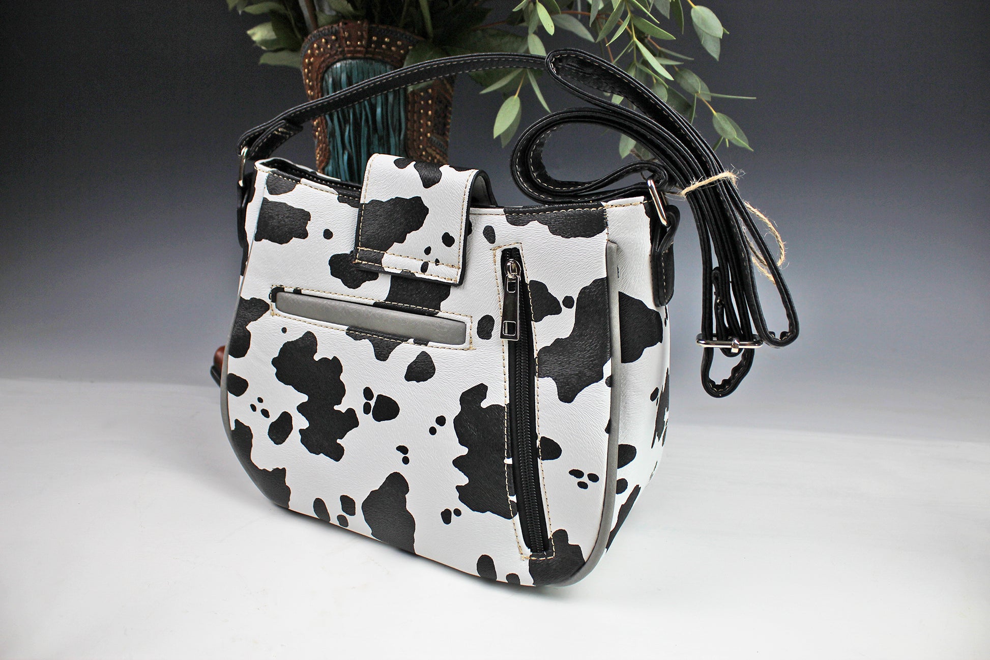 The Dallas Shoulder Bag - cowhide pattern western cowgirl style bag with intricate detailing with turquoise accents & an internal zip pocket