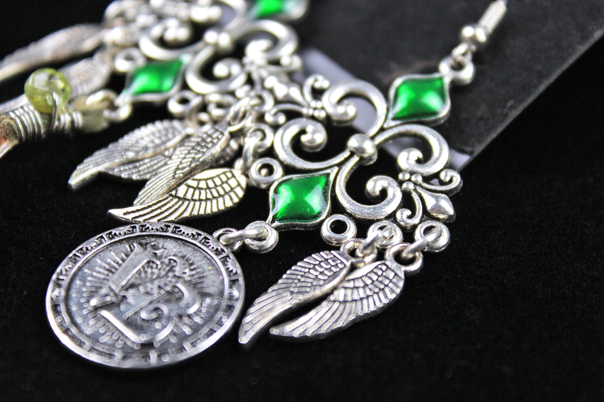 Emerald Forest Feather Earrings : Bohemian Style Feather Earrings With A Filigree Design