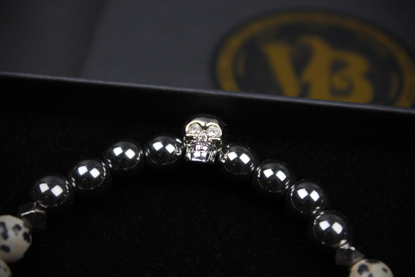 Skull Beaded Bracelet: Dalmatian Jasper, Onyx, Lava Stone & Hematite with Silver Detail