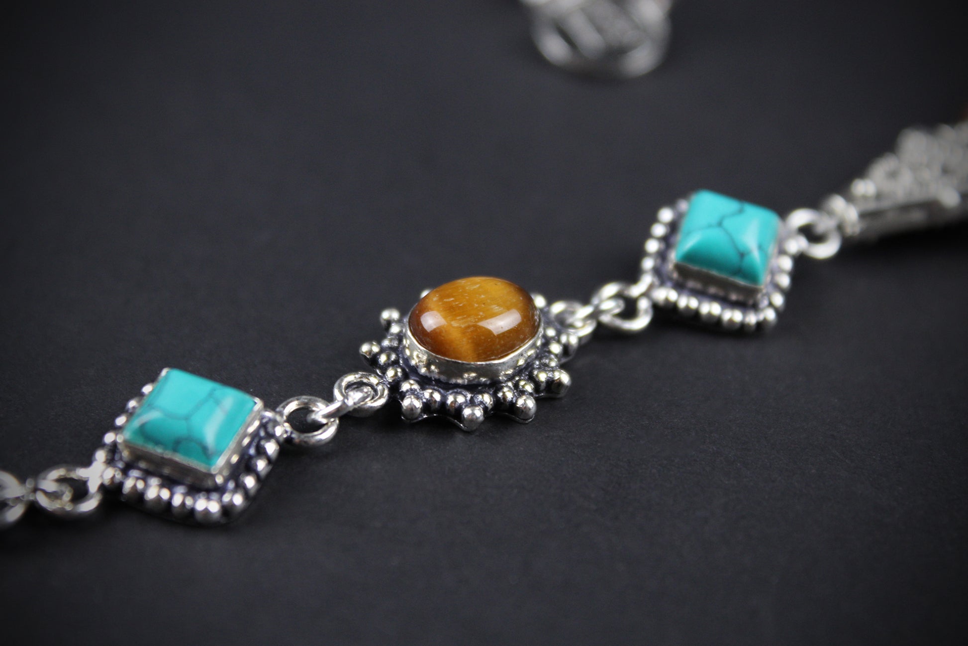 The Savannah Beaded Necklace: Turquoise, Tiger's Eye, Feather Charm