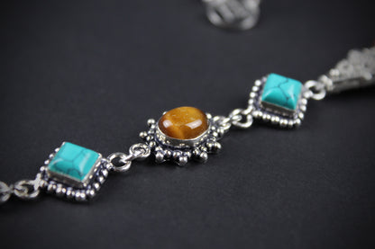 The Savannah Beaded Necklace: Turquoise, Tiger's Eye, Feather Charm