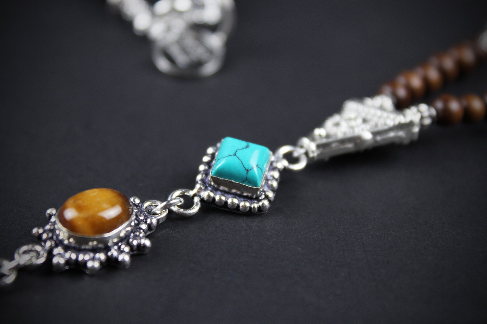 The Savannah Beaded Necklace: Turquoise, Tiger's Eye, Feather Charm