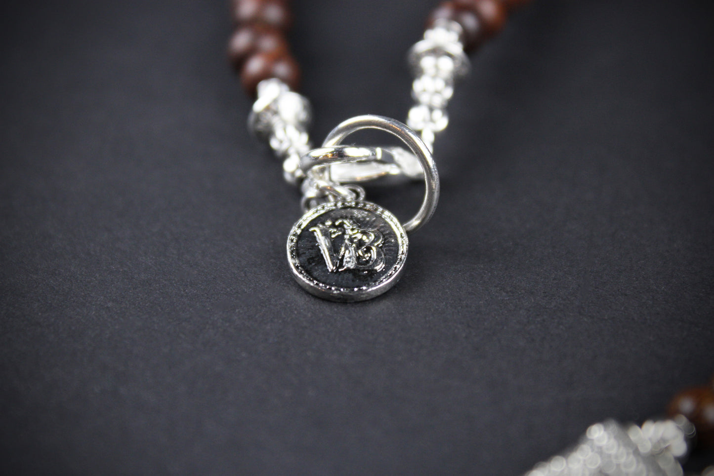 The Savannah Beaded Necklace: Turquoise, Tiger's Eye, Feather Charm