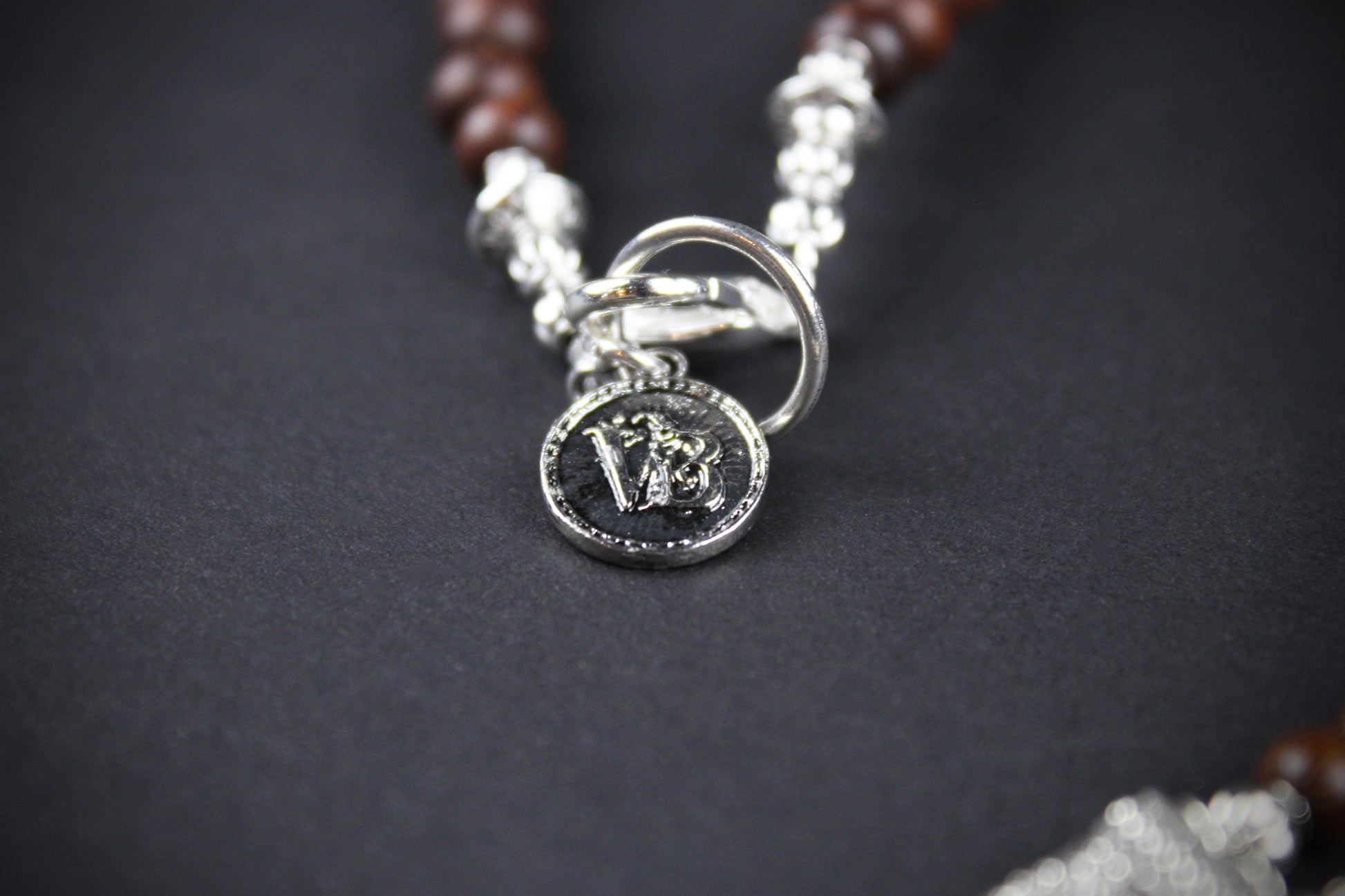 The Savannah Beaded Necklace: Turquoise, Tiger's Eye, Feather Charm