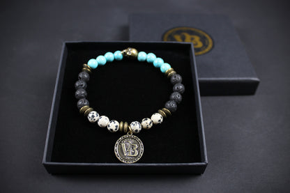 The Snake Eyes Bracelet - Lava Stone Howlite Dalmatian Jasper With Bronze Detail