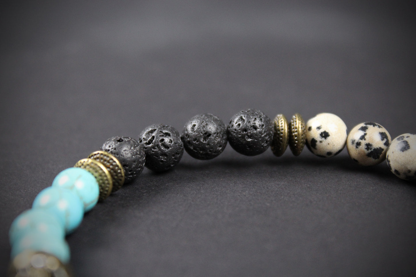 The Snake Eyes Bracelet - Lava Stone Howlite Dalmatian Jasper With Bronze Detail