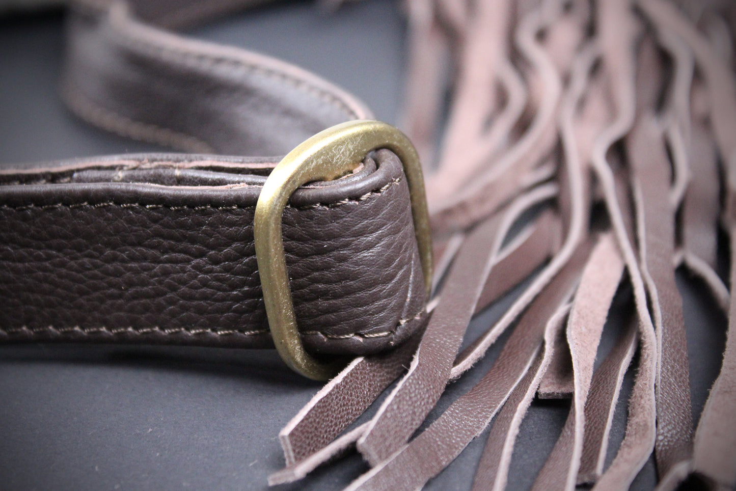 The Buffalo Girl Brown Leather Shoulder Bag : Acid Wash Cowhide with turquoise