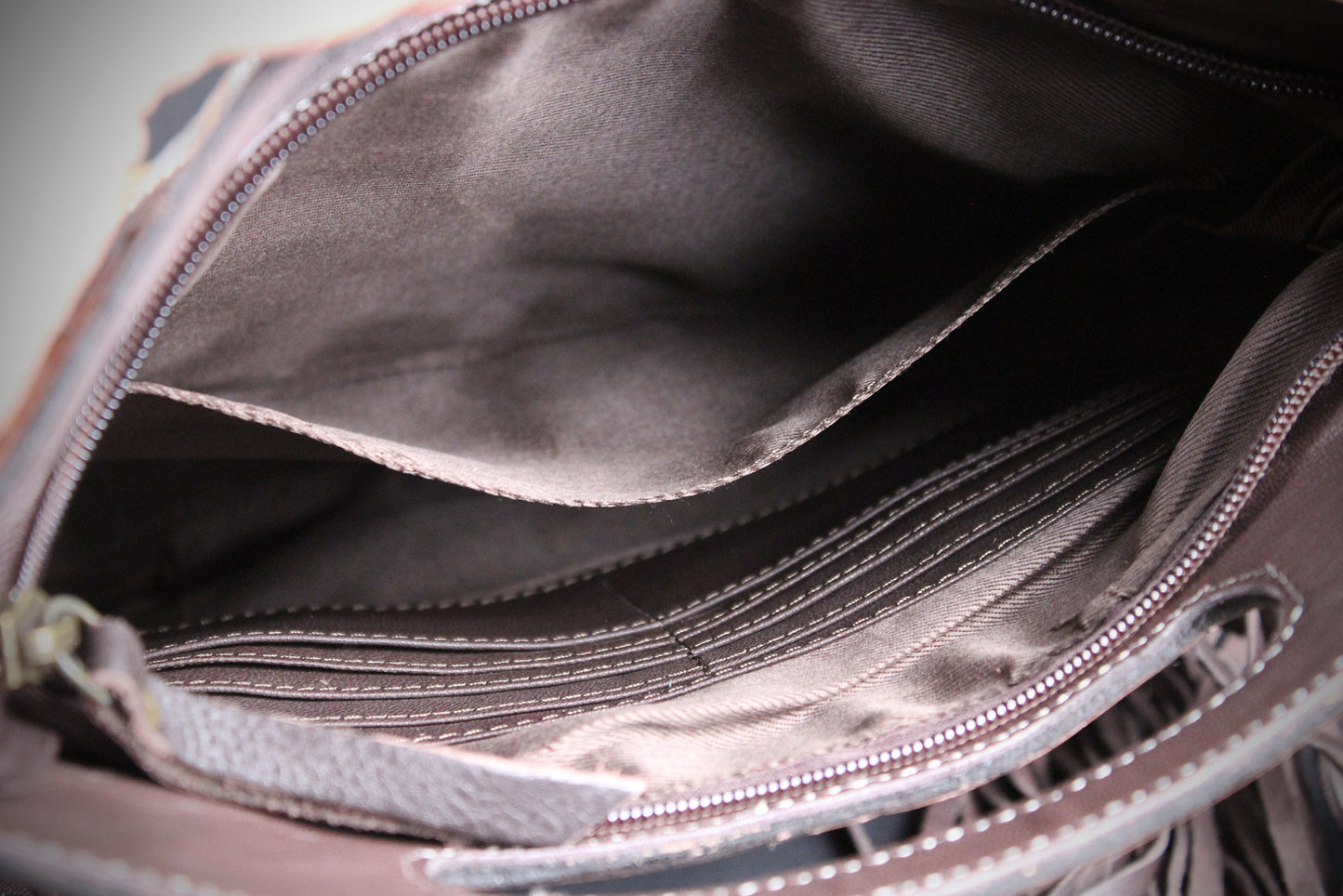 The Buffalo Girl Brown Leather Shoulder Bag : Acid Wash Cowhide with turquoise