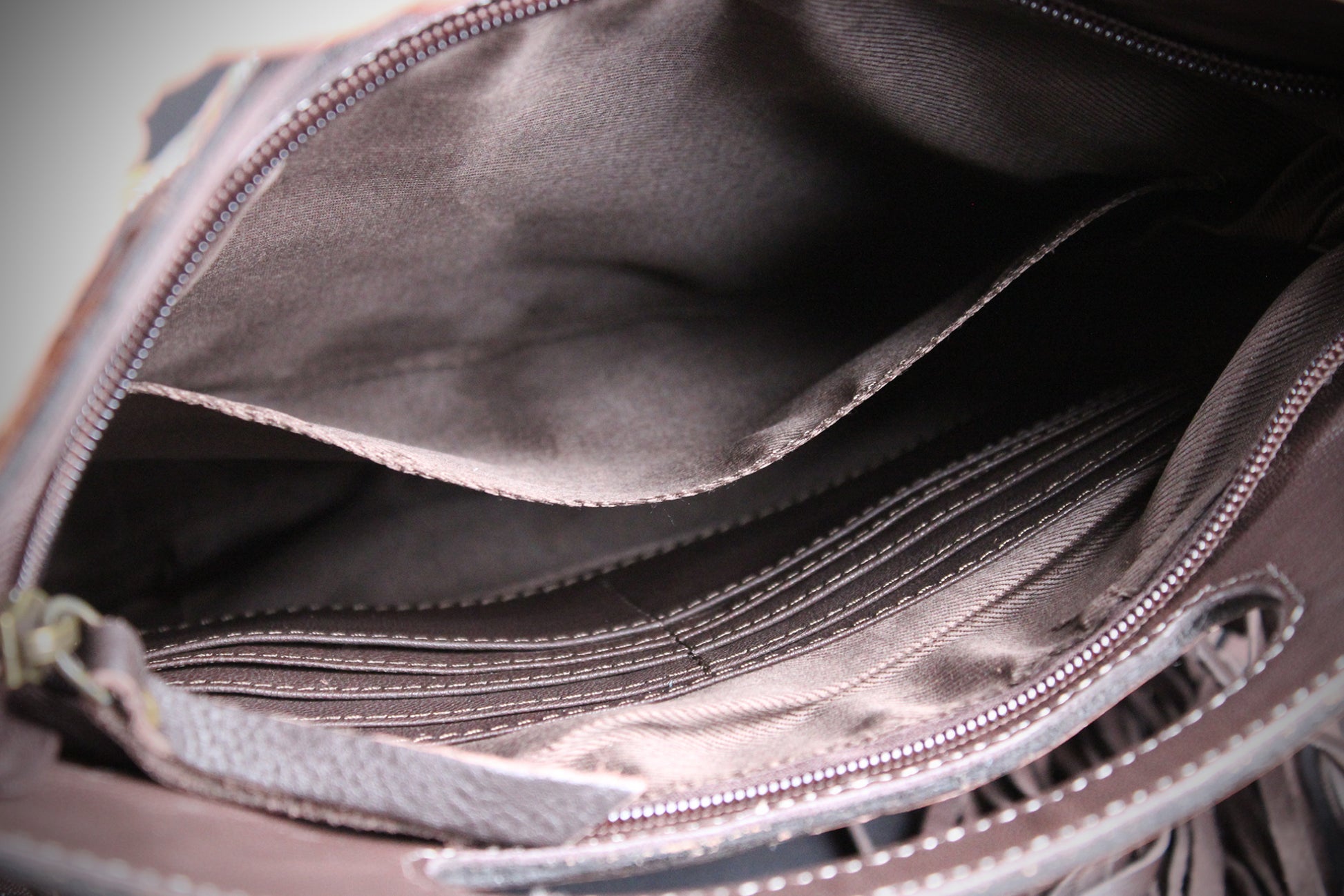 The Buffalo Girl Brown Leather Shoulder Bag : Acid Wash Cowhide with turquoise