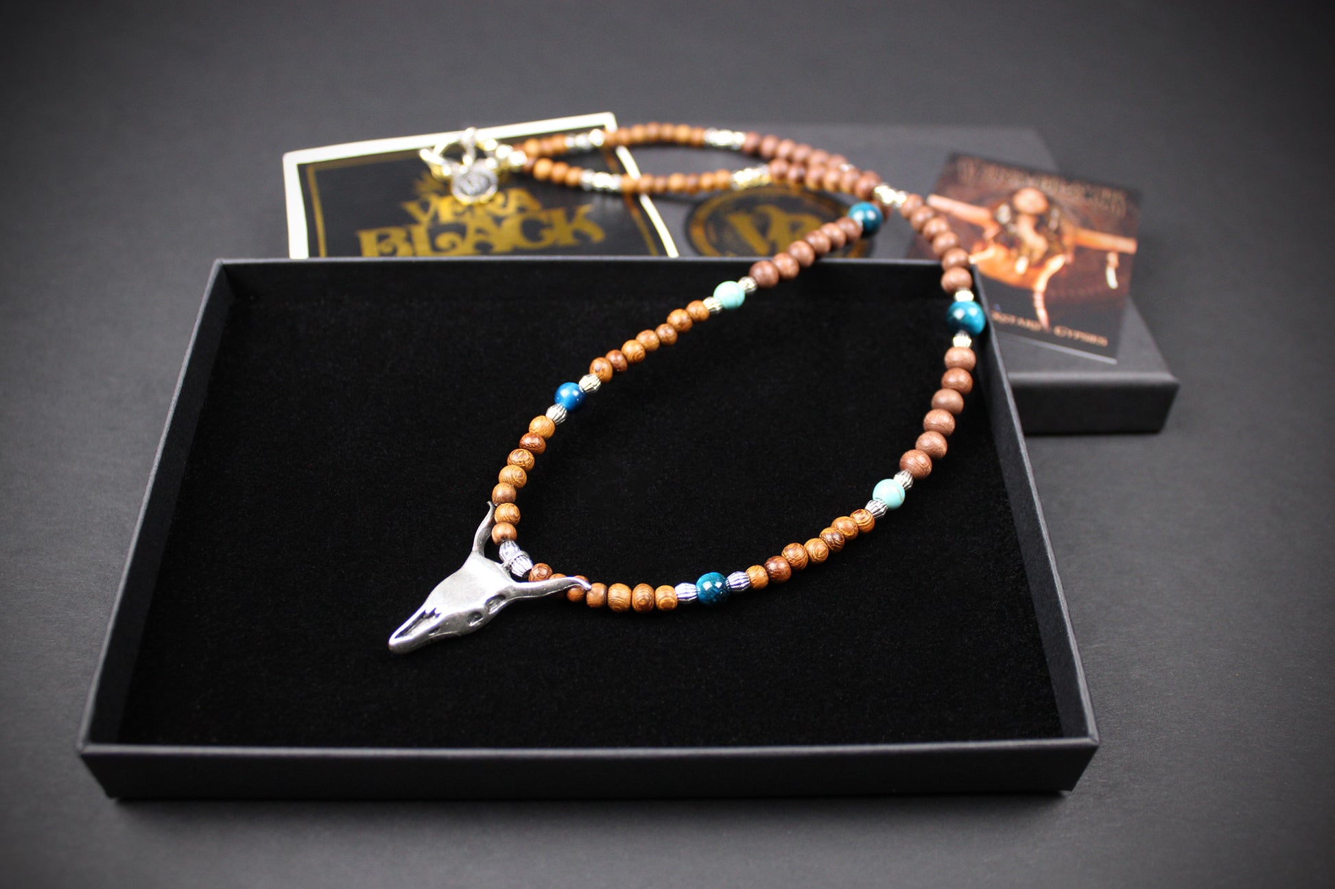 The Wyoming Necklace, Detailed with howlite, madre de cacao, blue/green tiger's eye and silver beading, all of this leading to a very cool ram's head pendant.