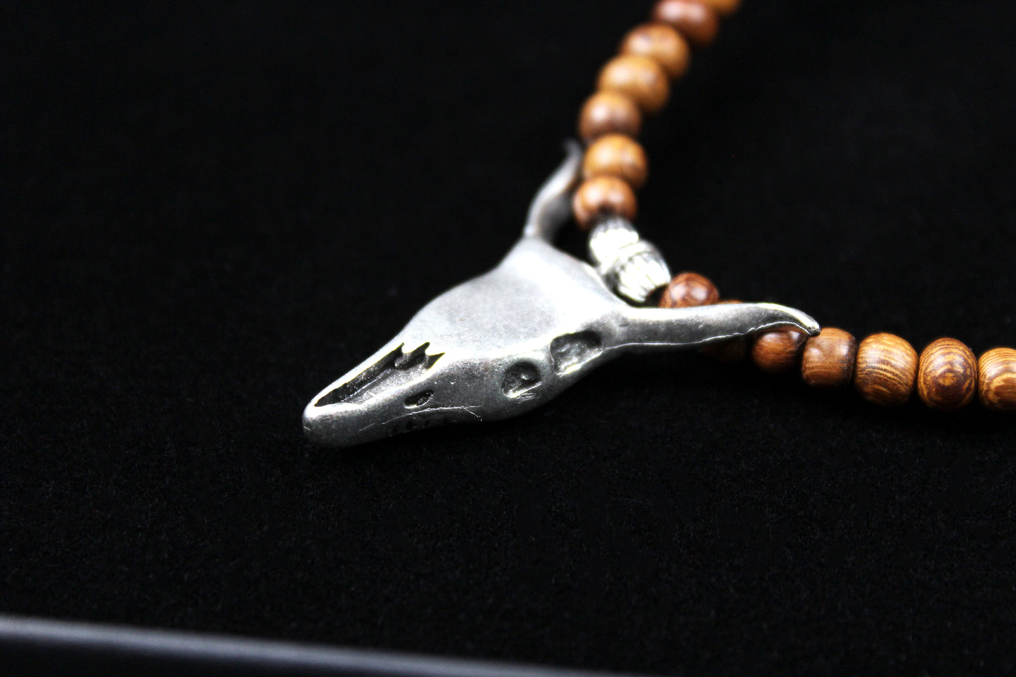 The Wyoming Necklace, Detailed with howlite, madre de cacao, blue/green tiger's eye and silver beading, all of this leading to a very cool ram's head pendant.