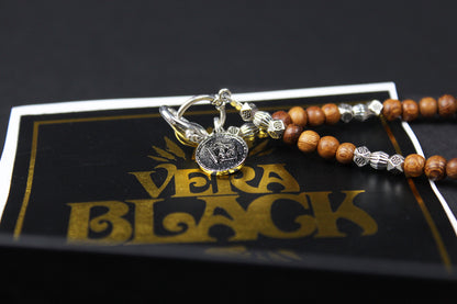 The Wyoming Necklace, Detailed with howlite, madre de cacao, blue/green tiger's eye and silver beading, all of this leading to a very cool ram's head pendant.