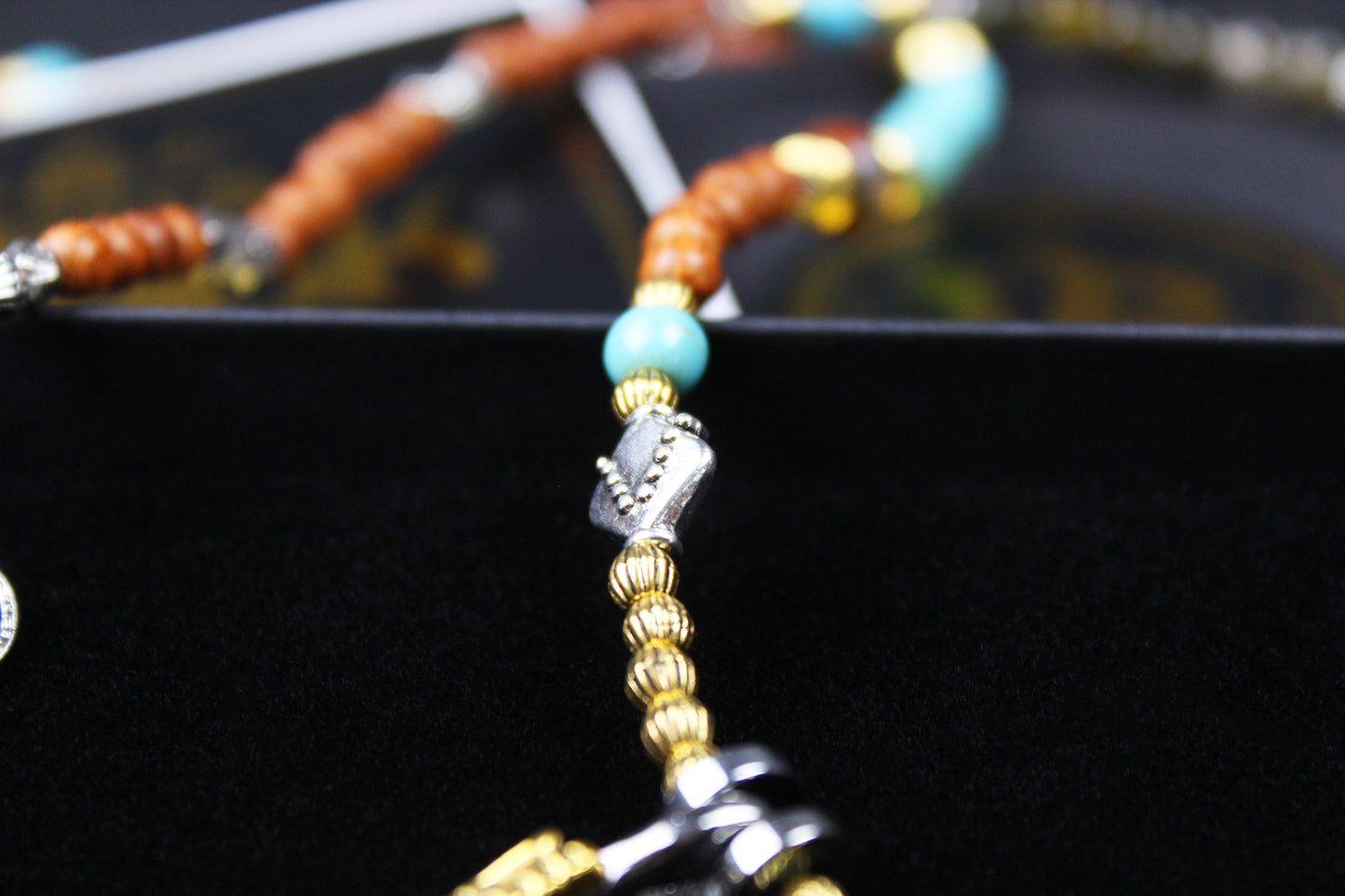 The Montana Necklace, Detailed with madre de cacao, howlite, tiger's eye and silver beading.