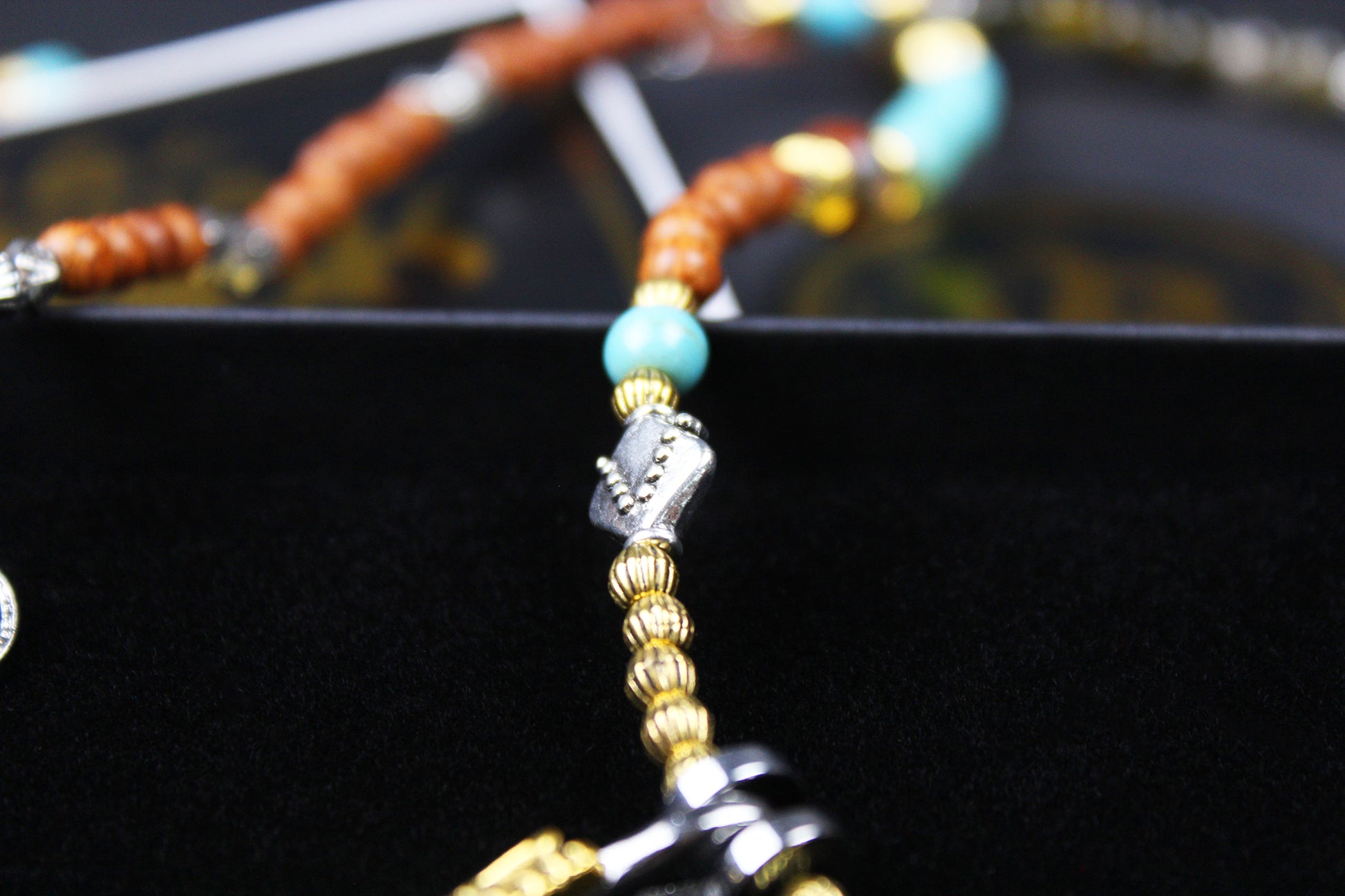 The Montana Necklace, Detailed with madre de cacao, howlite, tiger's eye and silver beading.