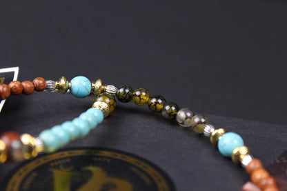 The Montana Necklace, Detailed with madre de cacao, howlite, tiger's eye and silver beading.