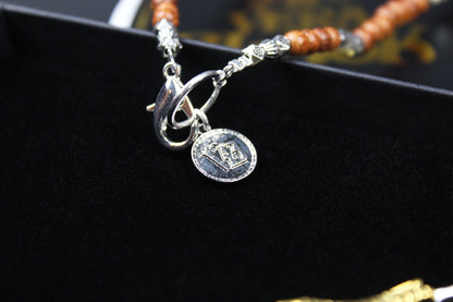 The Montana Necklace, Detailed with madre de cacao, howlite, tiger's eye and silver beading.