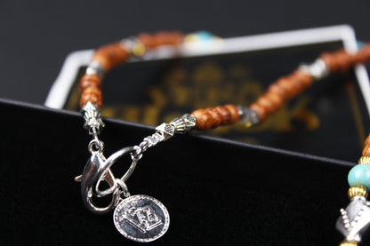 The Montana Necklace, Detailed with madre de cacao, howlite, tiger's eye and silver beading.
