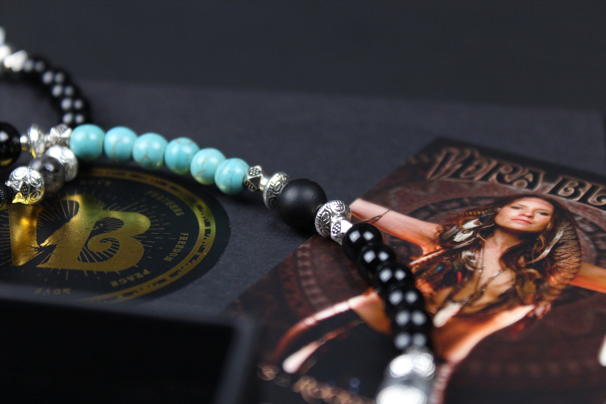 The Little Wing Necklace. Detailed with hematite, howlite, black wood beads and silver beading, all of this leading to a very cool feather pendant.
