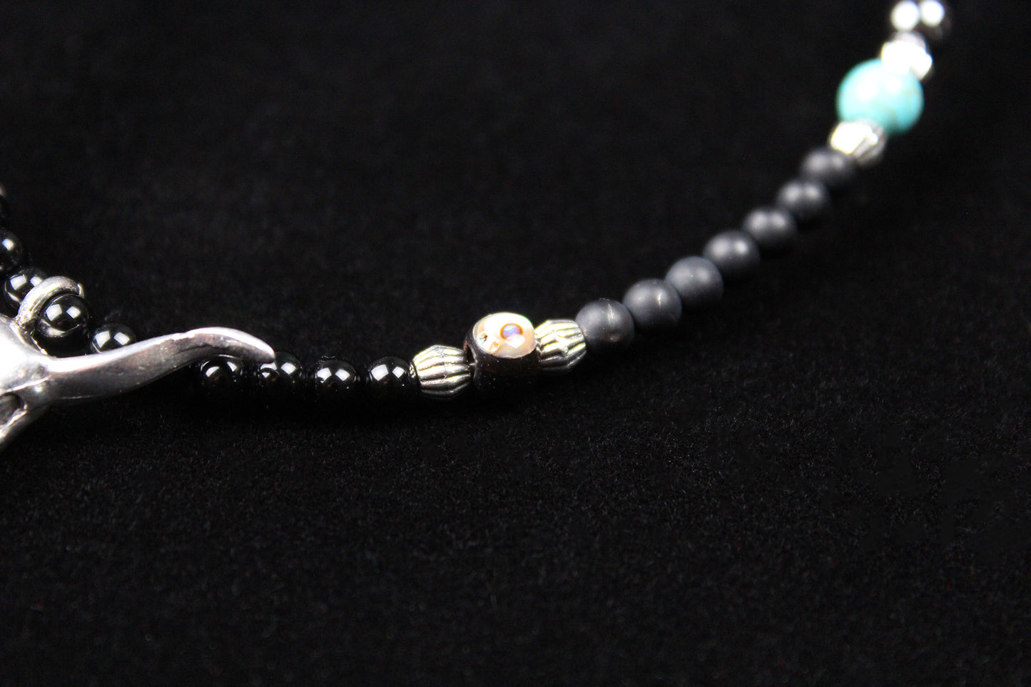 The Buffalo Smoke Necklace : Unisex Beaded Necklace Detailed with hematite, howlite, matte agate, lava stone, black onyx and silver beading, all of this leading to a very cool ram's head pendant.