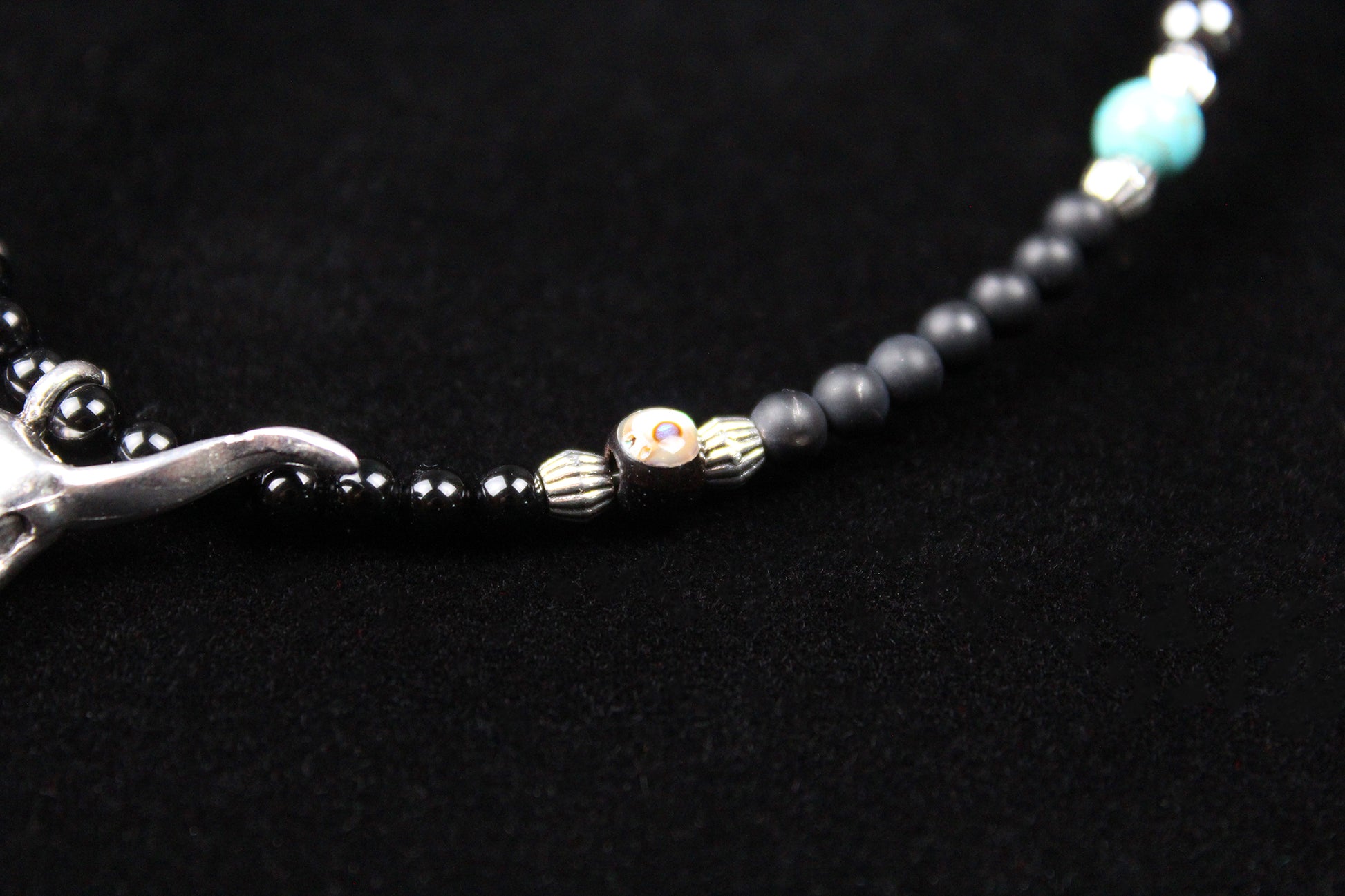 The Buffalo Smoke Necklace : Unisex Beaded Necklace Detailed with hematite, howlite, matte agate, lava stone, black onyx and silver beading, all of this leading to a very cool ram's head pendant.