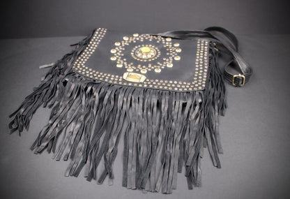 The Clover Bag : Black Edition, black goat leather shoulder bag with ornate detailing and adjustable strap.
