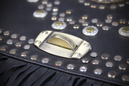 The Clover Bag : Black Edition, black goat leather shoulder bag with ornate detailing and adjustable strap.