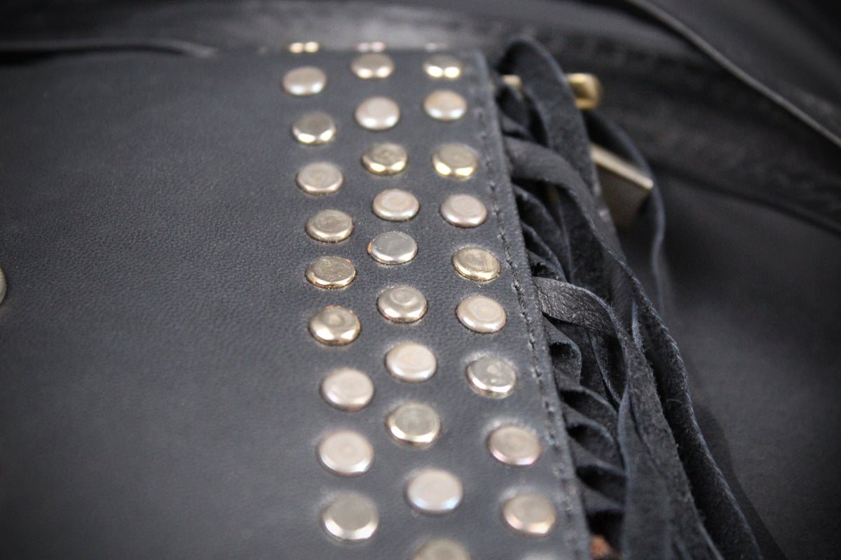 The Clover Bag : Black Edition, black goat leather shoulder bag with ornate detailing and adjustable strap.