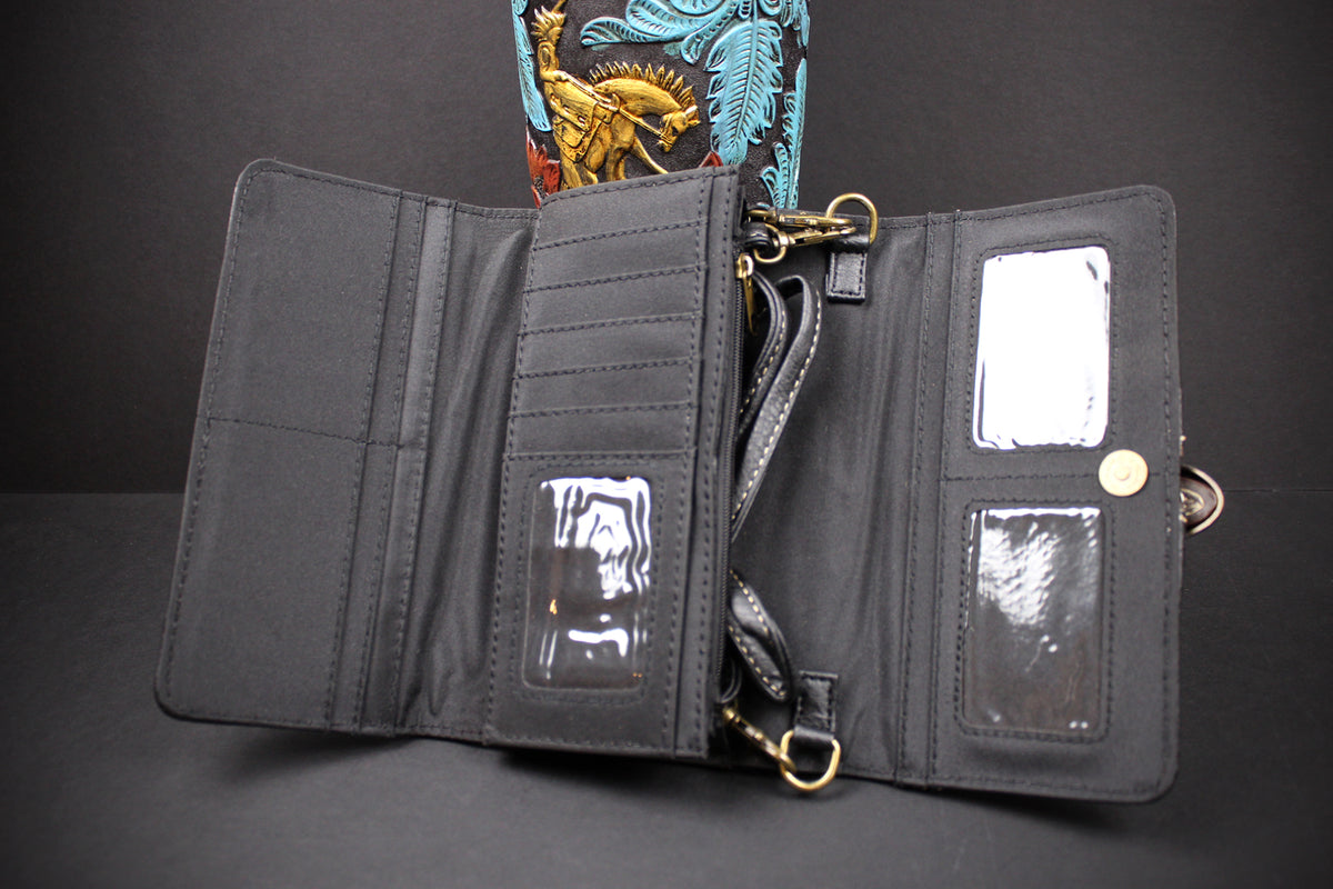 An open black nylon crossbody wallet with multiple card slots, clear ID windows, a detachable strap, and gold-tone hardware, photographed against a dark background.