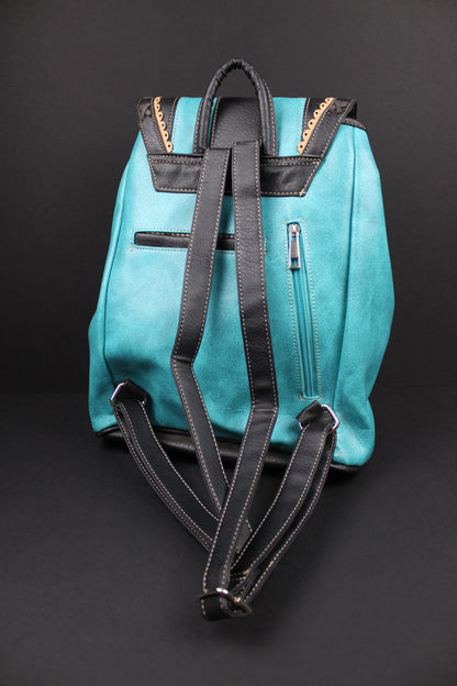 A turquoise blue faux leather backpack with black straps and trim, shown from the back against a dark background.