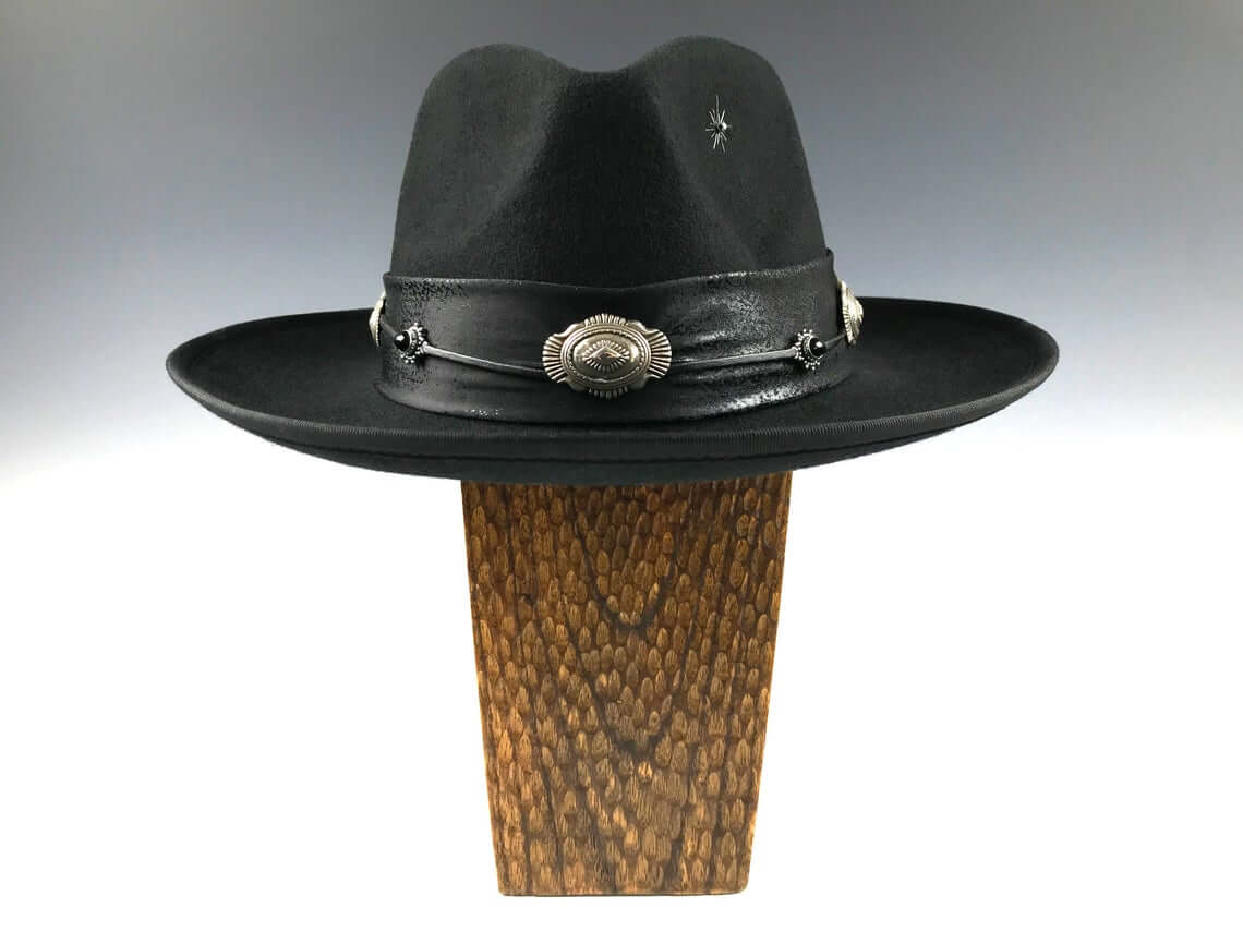 The Hombre Black Fedora Hat. Black wool felt fedora hat with a black leather look hat band with silver conchos and wild turkey with pheasant feather. rock n roll fedora hat.