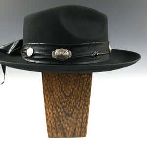 The Hombre Black Fedora Hat. Black wool felt fedora hat with a black leather look hat band with silver conchos and wild turkey with pheasant feather. rock n roll fedora hat.